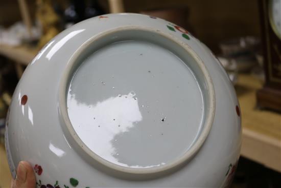 A Qianlong famille rose bowl and three blue and white plates